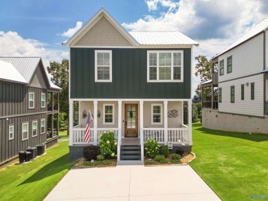 Discover refined Southern living in this stunning 3 bed, 3 bath on Gunters Landing in Alabama - for sale on GolfHomes.com, golf home, golf lot