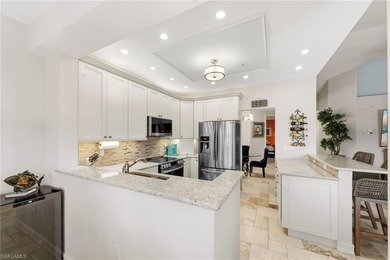 Rarely available and beautifully updated 2nd floor coach home in on The Colony Golf and Country Club in Florida - for sale on GolfHomes.com, golf home, golf lot