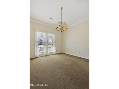 A lot of house for the money in a well-established neighborhood on The Plantation Golf Club in Mississippi - for sale on GolfHomes.com, golf home, golf lot