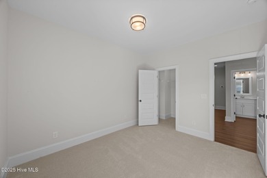 Holiday Special! Choose either a FREE golf cart or a Move-In on Carolina Colours Golf Club in North Carolina - for sale on GolfHomes.com, golf home, golf lot