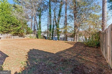 Welcome to this beautifully 4-bedroom, 2.5-bath home offering 1 on Sugar Creek Golf Course in Georgia - for sale on GolfHomes.com, golf home, golf lot