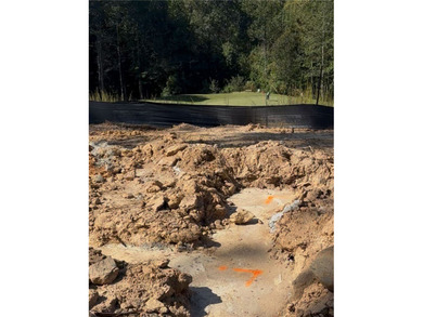 Nestled within the exclusive Old Edwards Reserve at Lake Keowee on The Reserve At Lake Keowee in South Carolina - for sale on GolfHomes.com, golf home, golf lot