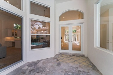 Beautiful courtyard home with guest house. Recently renovated on Frenchmans Reserve in Florida - for sale on GolfHomes.com, golf home, golf lot