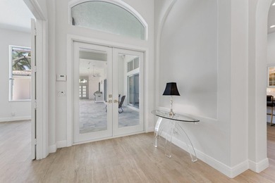 Beautiful courtyard home with guest house. Recently renovated on Frenchmans Reserve in Florida - for sale on GolfHomes.com, golf home, golf lot