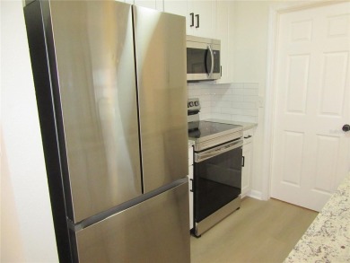 One or more photo(s) has been virtually staged. To help on Mainlands Golf Club in Florida - for sale on GolfHomes.com, golf home, golf lot