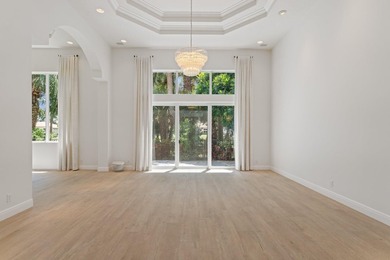 Beautiful courtyard home with guest house. Recently renovated on Frenchmans Reserve in Florida - for sale on GolfHomes.com, golf home, golf lot