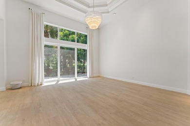 Beautiful courtyard home with guest house. Recently renovated on Frenchmans Reserve in Florida - for sale on GolfHomes.com, golf home, golf lot