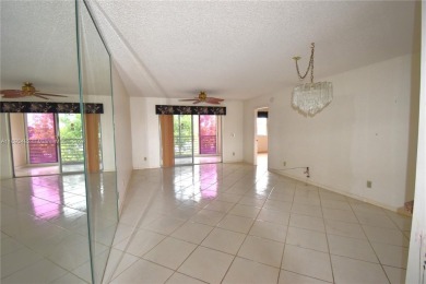 Spacious 2-bedroom 2 bath condo offers a good size kitchen with on Sunrise Lakes Phase IV Golf Course in Florida - for sale on GolfHomes.com, golf home, golf lot