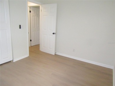 One or more photo(s) has been virtually staged. To help on Mainlands Golf Club in Florida - for sale on GolfHomes.com, golf home, golf lot