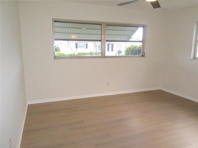 One or more photo(s) has been virtually staged. To help on Mainlands Golf Club in Florida - for sale on GolfHomes.com, golf home, golf lot