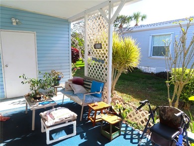 Nice 1993 home for the price in this 55 plus community of Snug on Barefoot Bay Golf Course in Florida - for sale on GolfHomes.com, golf home, golf lot