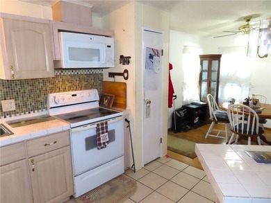 Nice 1993 home for the price in this 55 plus community of Snug on Barefoot Bay Golf Course in Florida - for sale on GolfHomes.com, golf home, golf lot