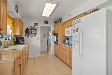 This well-maintained 2-bedroom, 2-bath home features a spacious on North Lakes Golf Course in Florida - for sale on GolfHomes.com, golf home, golf lot