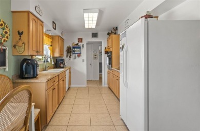 This well-maintained 2-bedroom, 2-bath home features a spacious on North Lakes Golf Course in Florida - for sale on GolfHomes.com, golf home, golf lot