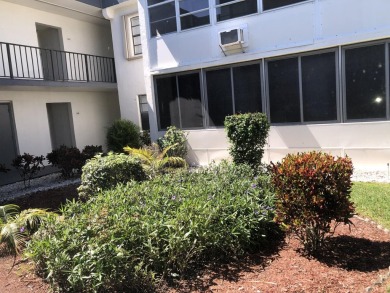 55+ ACTIVE Community. Garden view unit. Ceramic tile throughout on Kings Point Golf -Flanders Way in Florida - for sale on GolfHomes.com, golf home, golf lot
