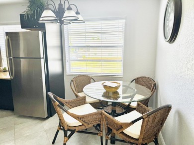 WOW! REMODELED, CORNER, 2 BEDROOM, 2 BATH STYLISHLY FURNISHED on Kings Point Golf -Flanders Way in Florida - for sale on GolfHomes.com, golf home, golf lot