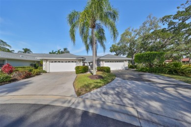 This gorgeous end unit condo overlooks the 1st tee of the on Palm Aire Country Club of Sarasota in Florida - for sale on GolfHomes.com, golf home, golf lot
