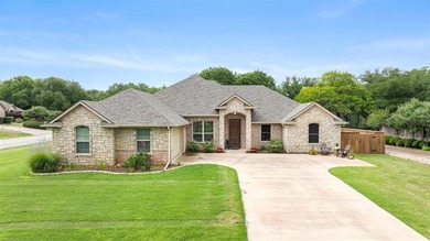Beautiful, well maintained home built in 2015 is well placed on Pecan Plantation Country Club in Texas - for sale on GolfHomes.com, golf home, golf lot