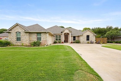 Beautiful, well maintained home built in 2015 is well placed on Pecan Plantation Country Club in Texas - for sale on GolfHomes.com, golf home, golf lot