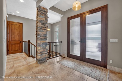 Set on two lots on the Hawk Hollow Golf Course, this sprawling on Hawk Hollow Golf Course  in Michigan - for sale on GolfHomes.com, golf home, golf lot