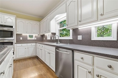 Welcoming 2026 with a price adjstment! Stunning custom built by on Brookstone Golf and Country Club in Georgia - for sale on GolfHomes.com, golf home, golf lot