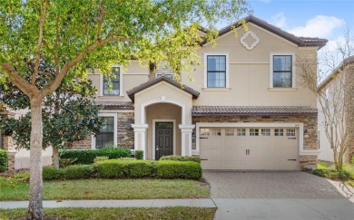 This VACATION HOME CHECKS ALL THE BOXES YOU'VE BEEN LOOKING FOR! on The Oasis Club at Champions Gate in Florida - for sale on GolfHomes.com, golf home, golf lot
