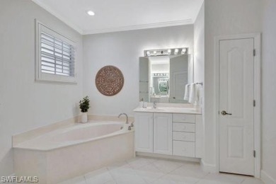 Welcome to this stunning move-in ready first-floor coach home on Royal Poinciana Golf Club in Florida - for sale on GolfHomes.com, golf home, golf lot