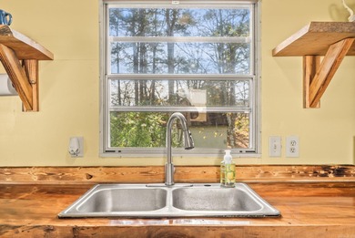 GREAT CONDITION + AFFORDABLE! You'll love being by the lake! on Mountain Ranch Golf Club in Arkansas - for sale on GolfHomes.com, golf home, golf lot