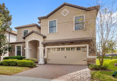 This VACATION HOME CHECKS ALL THE BOXES YOU'VE BEEN LOOKING FOR! on The Oasis Club at Champions Gate in Florida - for sale on GolfHomes.com, golf home, golf lot