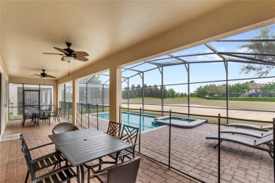 This VACATION HOME CHECKS ALL THE BOXES YOU'VE BEEN LOOKING FOR! on The Oasis Club at Champions Gate in Florida - for sale on GolfHomes.com, golf home, golf lot