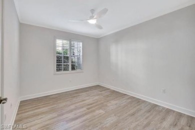 Welcome to this stunning move-in ready first-floor coach home on Royal Poinciana Golf Club in Florida - for sale on GolfHomes.com, golf home, golf lot