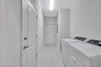 Welcome to this stunning move-in ready first-floor coach home on Royal Poinciana Golf Club in Florida - for sale on GolfHomes.com, golf home, golf lot