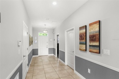 This VACATION HOME CHECKS ALL THE BOXES YOU'VE BEEN LOOKING FOR! on The Oasis Club at Champions Gate in Florida - for sale on GolfHomes.com, golf home, golf lot