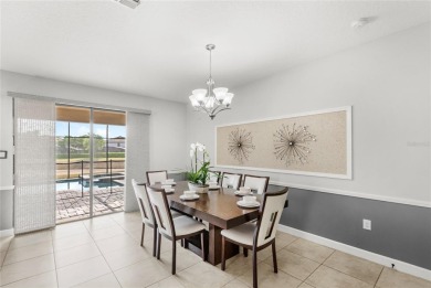 This VACATION HOME CHECKS ALL THE BOXES YOU'VE BEEN LOOKING FOR! on The Oasis Club at Champions Gate in Florida - for sale on GolfHomes.com, golf home, golf lot