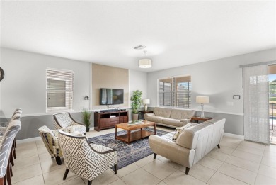 This VACATION HOME CHECKS ALL THE BOXES YOU'VE BEEN LOOKING FOR! on The Oasis Club at Champions Gate in Florida - for sale on GolfHomes.com, golf home, golf lot