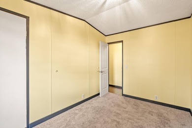 GREAT CONDITION + AFFORDABLE! You'll love being by the lake! on Mountain Ranch Golf Club in Arkansas - for sale on GolfHomes.com, golf home, golf lot