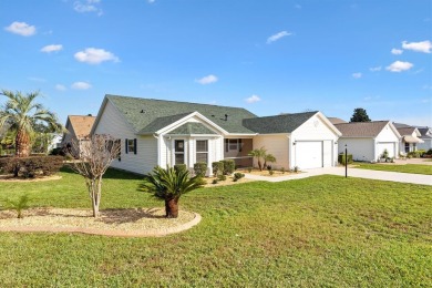 THIS HOME IS PRICED TO SELL! Updated 1,863 sq. ft. 3 bedroom 2 on El Santiago Executive Golf Course in Florida - for sale on GolfHomes.com, golf home, golf lot