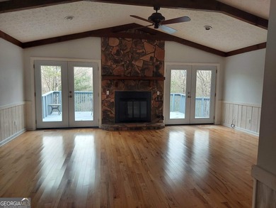 This adorable 4-bedroom, 4.5-bathroom mountain cabin is located on Sky Valley Resort and Country Club in Georgia - for sale on GolfHomes.com, golf home, golf lot