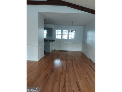 This adorable 4-bedroom, 4.5-bathroom mountain cabin is located on Sky Valley Resort and Country Club in Georgia - for sale on GolfHomes.com, golf home, golf lot