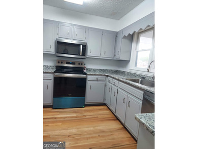 This adorable 4-bedroom, 4.5-bathroom mountain cabin is located on Sky Valley Resort and Country Club in Georgia - for sale on GolfHomes.com, golf home, golf lot