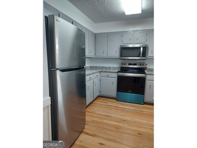 This adorable 4-bedroom, 4.5-bathroom mountain cabin is located on Sky Valley Resort and Country Club in Georgia - for sale on GolfHomes.com, golf home, golf lot