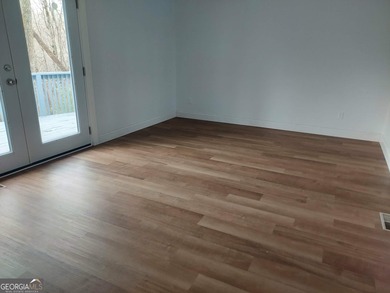 This adorable 4-bedroom, 4.5-bathroom mountain cabin is located on Sky Valley Resort and Country Club in Georgia - for sale on GolfHomes.com, golf home, golf lot