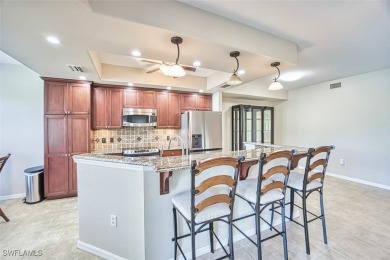 Welcome to your dream condo in the prestigious Colonial Country on Colonial Country Club in Florida - for sale on GolfHomes.com, golf home, golf lot