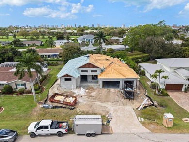 Under construction and slated for completion June 2026, this on Country Club of Naples in Florida - for sale on GolfHomes.com, golf home, golf lot