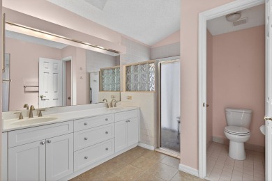 Welcome to this charming single-story home in the gated Barclay on PGA National Golf Club in Florida - for sale on GolfHomes.com, golf home, golf lot