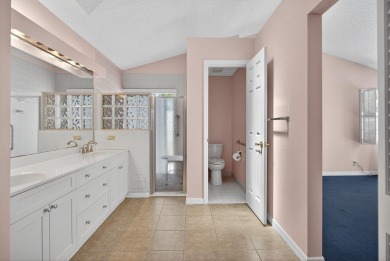 Welcome to this charming single-story home in the gated Barclay on PGA National Golf Club in Florida - for sale on GolfHomes.com, golf home, golf lot