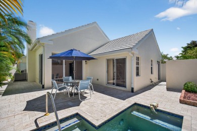 Welcome to this charming single-story home in the gated Barclay on PGA National Golf Club in Florida - for sale on GolfHomes.com, golf home, golf lot