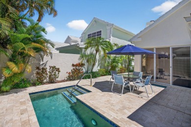 Welcome to this charming single-story home in the gated Barclay on PGA National Golf Club in Florida - for sale on GolfHomes.com, golf home, golf lot