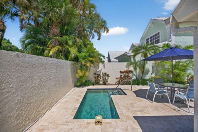 Welcome to this charming single-story home in the gated Barclay on PGA National Golf Club in Florida - for sale on GolfHomes.com, golf home, golf lot
