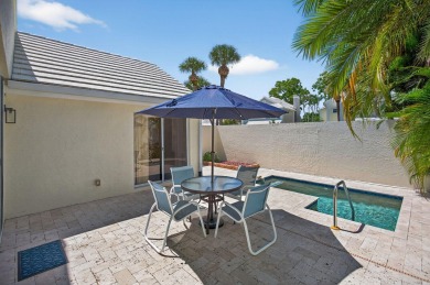 Welcome to this charming single-story home in the gated Barclay on PGA National Golf Club in Florida - for sale on GolfHomes.com, golf home, golf lot